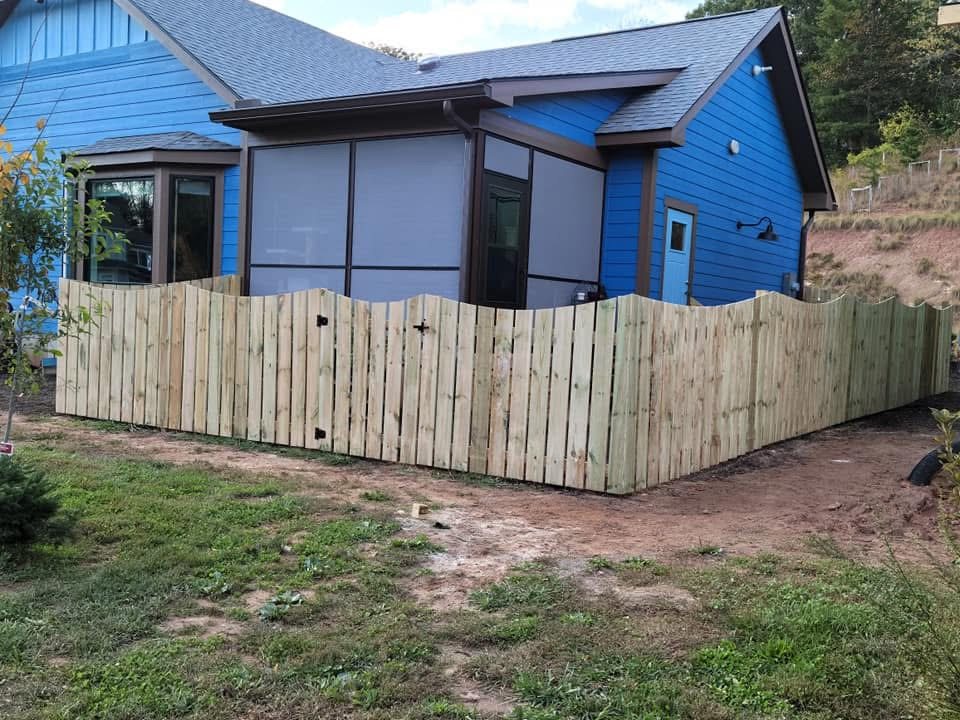 Dog-ear wood privacy fence at a new build